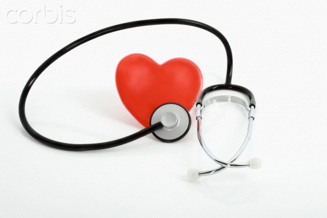 Heart with stethoscope on white background
